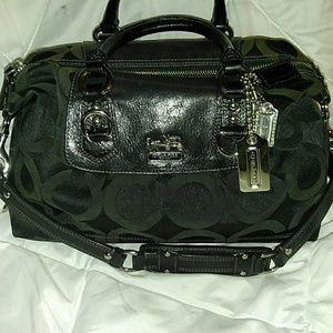 Black Coach purse, slightly discolored